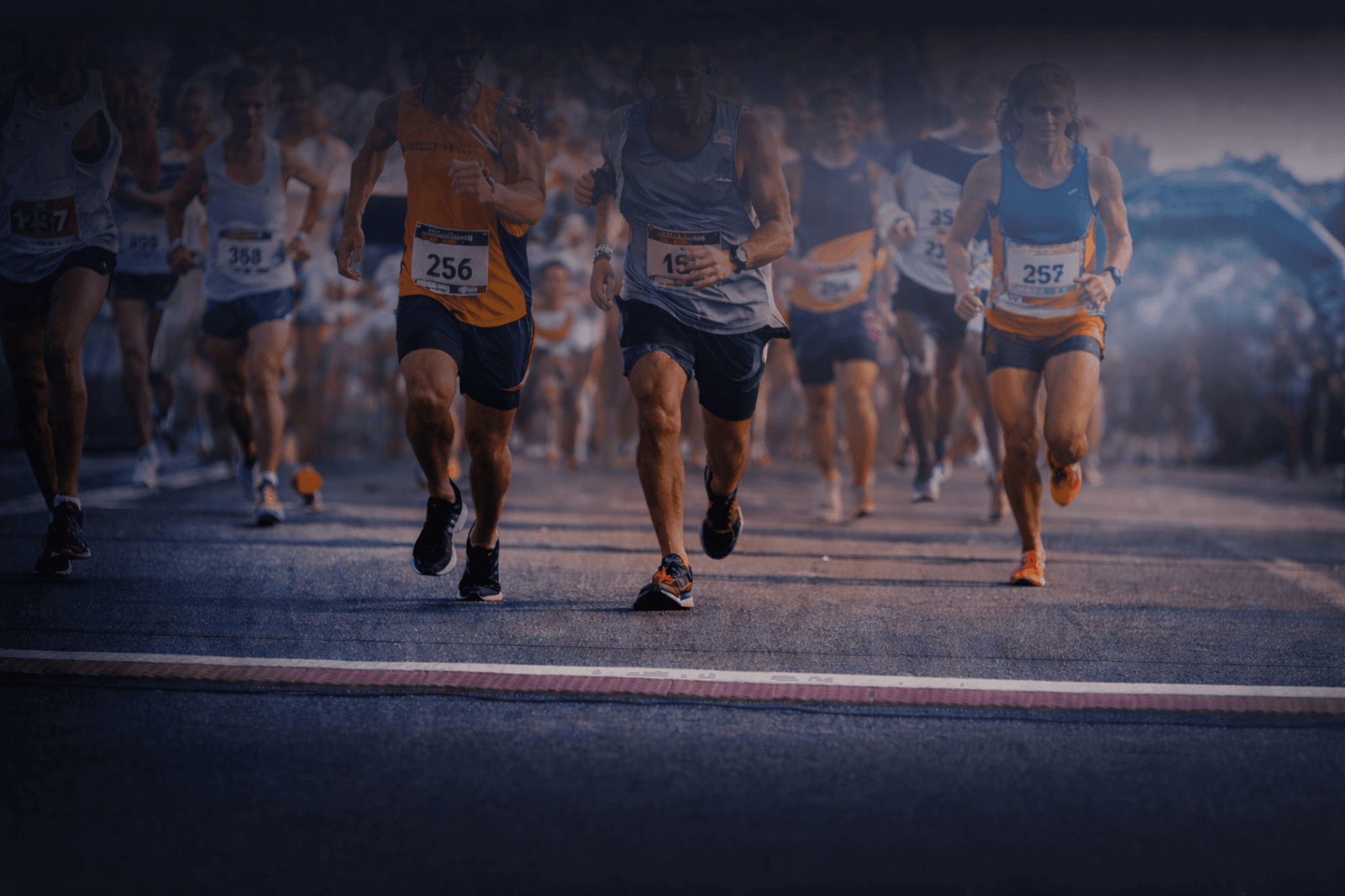 Runners sprinting through a race course